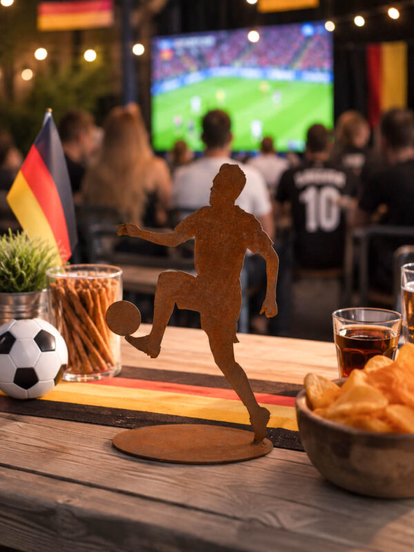 Fußballspieler auf Bodenplatte